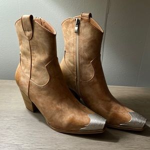 Brand new without tag/shoe box tan booties with silver toe.
